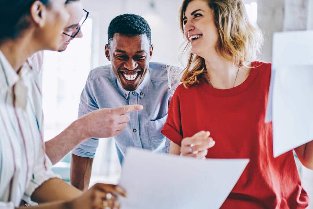 coworkers laughing togteher
